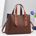 Elegant brown faux leather crossbody handbag with dual handles and gold metal accents - Brown