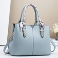 Minimalist light blue women's handbag with silk scarf and gold hardware accents - Blue