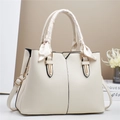 Chic beige crossbody handbag with lychee texture leather and decorative silk scarf handle - Off-white