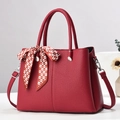 Deep red lychee pattern leather handbag with crossbody strap and silk scarf detail - Wine Red