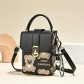 Fashionable black leather handbag with cute bear pattern and golden lock clasp for women - Black
