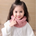 Pink knitted winter scarf for kids worn by a toddler model on light wooden background - Dusky Pink