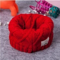 Kids red knit infinity scarf with mustache patch detail on soft grey background - Red