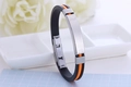 Zwart en oranje siliconen armband met roestvrijstalen plaatje en sluiting - Oranje