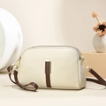 Chic beige crossbody bag with brown straps and dual gold zippers for women's daily style - Off White
