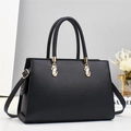 Elegant black litchi pattern leather handbag for women with golden hardware and strap - Black
