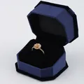 Golden daisy flower ring presented in a premium dark blue octagonal velvet jewelry gift box - Ring Box / Blue With Black Interior