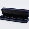 Silver necklace with green round gemstone pendant in long blue velvet jewelry box - Necklace Box / Blue With Black Interior
