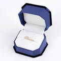 Golden marquise ring with pavé zircons in a navy blue octagonal velvet jewelry box - Ring Box / Blue With White Interior