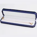 Golden heart necklace with white pearl in a deep blue velvet rectangle jewelry box - Necklace Box / Blue With White Interior