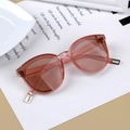 Kids fashion sunglasses with translucent amber frame and gold metal hinge accents - Pink