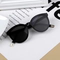Fashionable oversized black cat-eye kids sunglasses with gold metal hinge detail - Black