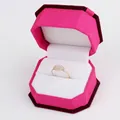 Rose red textured fabric jewelry box featuring a gold leaf-shaped ring with pavé diamonds - Ring Box / Rose With White Interior