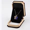 Elegant four-leaf clover pendant necklace with blue crystals in an octagonal velvet box - Large Pendant Box / Yellow With Black Interior