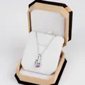 Silver necklace with purple gemstone pendant inside a brown octagonal jewelry gift box - Large Pendant Box / Yellow With White Interior