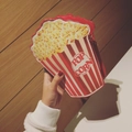 Detail showing red and white striped popcorn crossbody bag with POP CORN text - Beige Floral