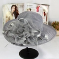 Detail of grey sun hat featuring elegant organza flowers and feather accents - M (56-58cm) / Gray