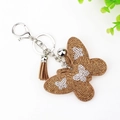 Portachiavi a farfalla marrone con nappa beige e strass scintillanti oro e argento - Cachi