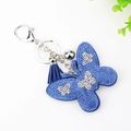 Portachiavi con farfalla di strass blu, nappa coordinata e campanellino in argento - Blu