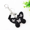 Black velvet butterfly keychain with sparkling rhinestones, silver bell and tassel - Black