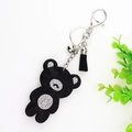 Detail of black rhinestone bear keychain with silver metal lobster clasp and fringe - Large / Black