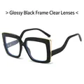 Oversized black square frame glasses with wavy temples and clear lenses in a 45-degree view - Black Frame Clear Lenses