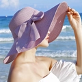 Elegant lavender wide brim straw beach hat with a large decorative ribbon bow - Light Purple