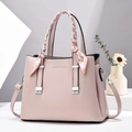 Elegant mauve lychee texture shoulder bag with scarf handle and fashion branding - Light Pink