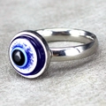Polished stainless steel ring featuring a blue evil eye motif in a minimalist silver band - US 8 / Silver