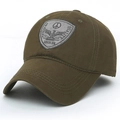 Olive green cotton baseball cap featuring an embroidered shield patch for outdoor sports - Adjustable / Army Green