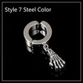 Gothic style stainless steel ear cuff with skull hand pendant in polished steel finish - Ghost Hand / Steel