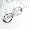 Sleek silver metal hair clip with a minimalist infinity symbol design for women - Infinity / Silver