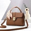 Brown lychee leather handbag with golden lock and houndstooth scarf on top handle - Coffee