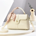 Chic cream leather handbag with houndstooth silk scarf handle and gold metal twist lock - Off-white