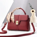 Dark red lychee leather handbag with golden lock and houndstooth scarf handle detail - Burgundy