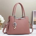 Elegant mauve women's handbag with textured stripes, silver hardware and a star-moon charm - Dusky Pink