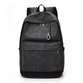 Casual black canvas backpack with large front pocket and decorative zip pullers - Black