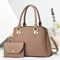 Detail showing textured weave pattern on pink shoulder bag and matching pouch - Khaki