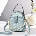 Light blue mini handbag with circular logo print, pearl chain, and top handle - 15x19x8cm / Sky Blue