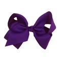 Detailed close-up of a large purple grosgrain ribbon hair bow for kids and babies - Dark Purple