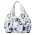 Detail of white leather handbag featuring grey floral fabric and silver metal hardware - White Patchwork with Grey Vintage Floral (Style 14)