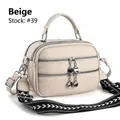 Minimalist beige handbag with litchi texture and geometric pattern shoulder strap - Beige
