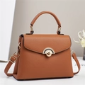 Caramel lychee grain leather handbag with gold wavy buckle and adjustable shoulder strap - Khaki/Earth Yellow