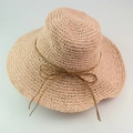 Pink wide brim raffia straw sun hat for women with elegant brown leather bow decoration - Light Pink