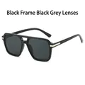 Gafas de sol aviador cuadradas con montura negra, lentes grises y detalles dorados - Montura Negra Lentes Gris Negro