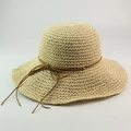 Classic wide brim raffia sun hat in cream beige with a slim brown leather bow detail - Beige