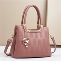 Elegant dusty pink crossbody bag with geometric texture and star shell charm detail - 26x12x20cm / Pink
