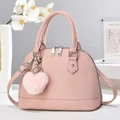 Pink lychee grain shell handbag with heart charm and shoulder strap for women - Pink