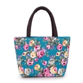 Florale Canvas-Tragetasche mit Rosenmuster und braunen Seilgriffen in Blaugrün - Blau