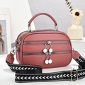 Dusty pink litchi leather handbag with patterned wide strap and double front zippers - Pink